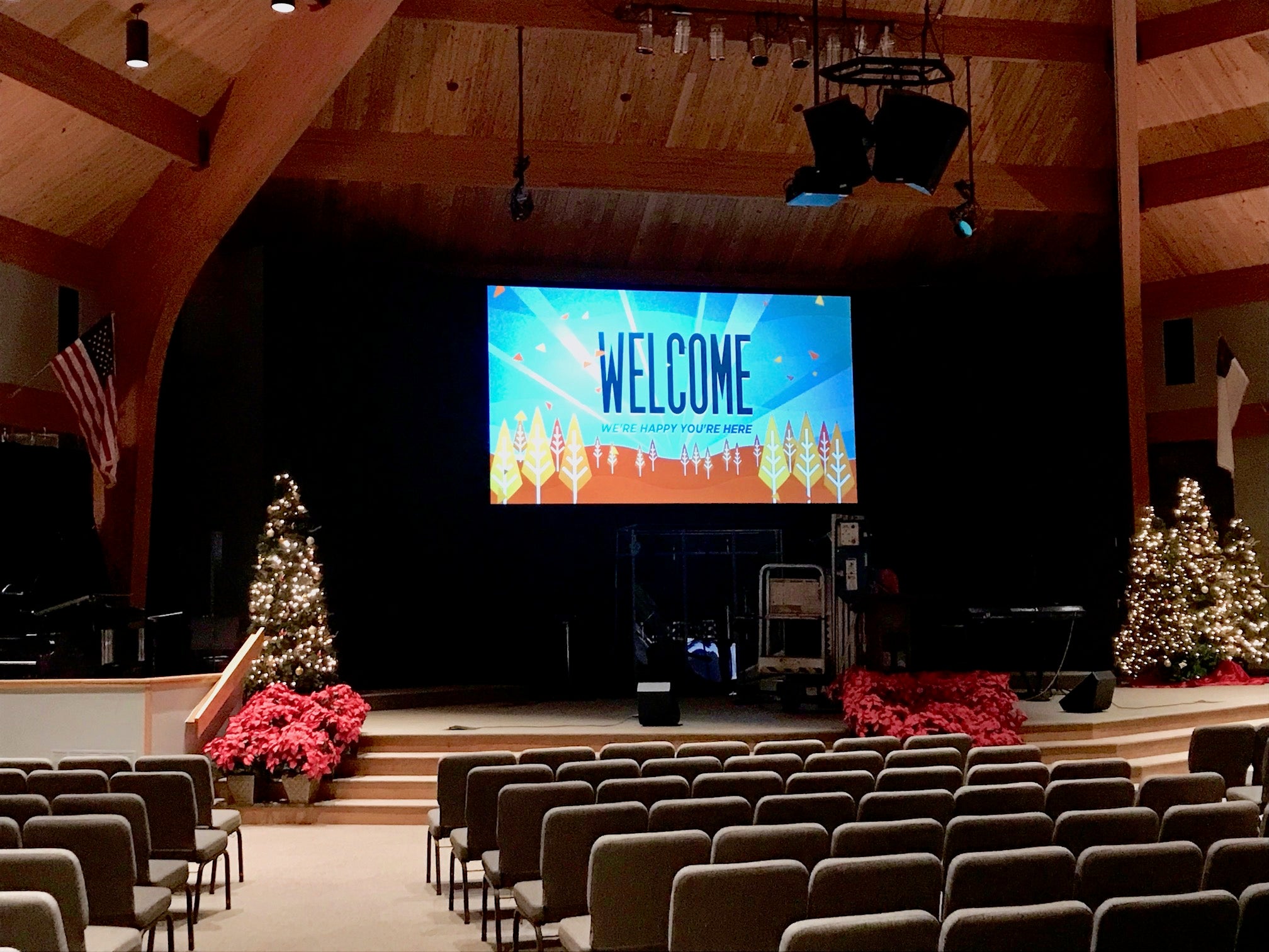East Side Grace Brethren Church - Da-Lite 16x9 Cinema Contour screen with Parallax Stratos fabric and a Panasonic PT-RZ120U7 12,600 lumen HD projector.