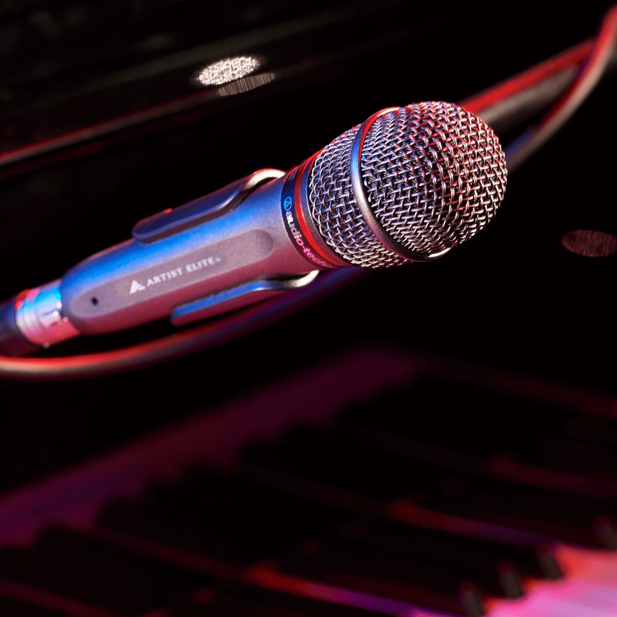 Audio-Technica AE4100 - Cardioid Dynamic Handheld Microphone shown onstage