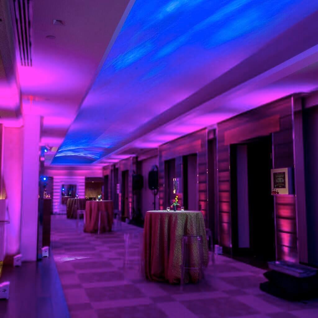 Chauvet DJ Freedom Par H9 IP - RGBAW+UV LED Wireless Uplight, deployed in a hallway