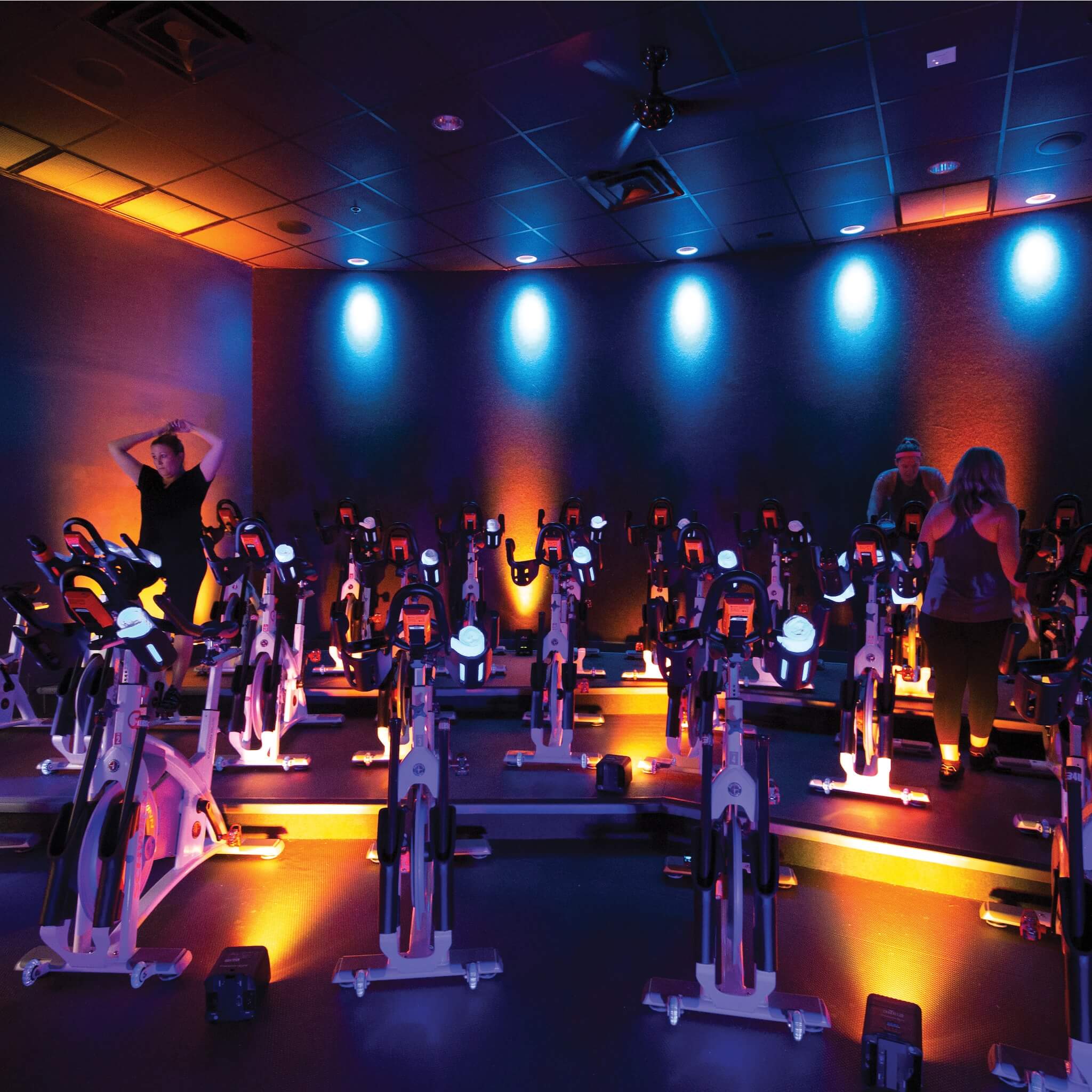 Chauvet DJ Freedom Par Q9 - RGBA LED Wireless Uplight, deployed in a spin class