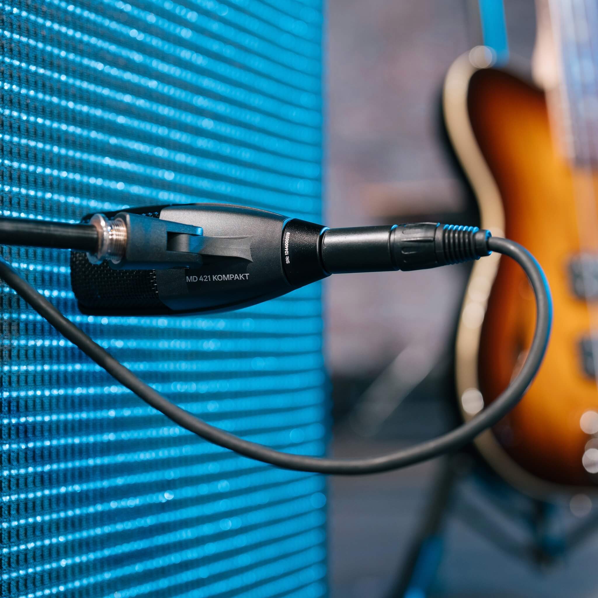 Sennheiser MD 421 Kompakt - Multipurpose Dynamic Cardioid Microphone, guitar cabinet on stage