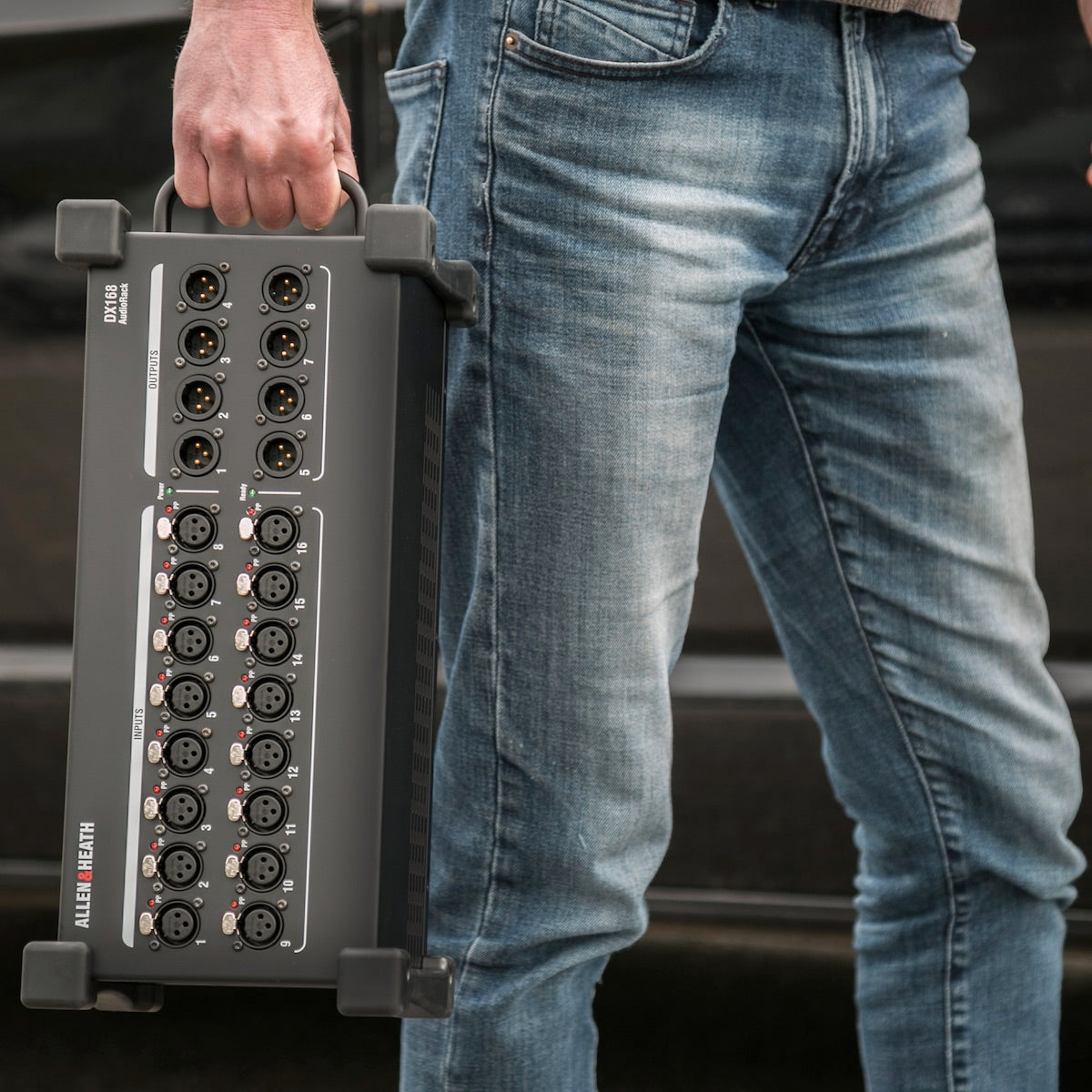 Allen & Heath DX168 - 16 XLR Input, 8 XLR Output, 96kHz DX Expander, being carried