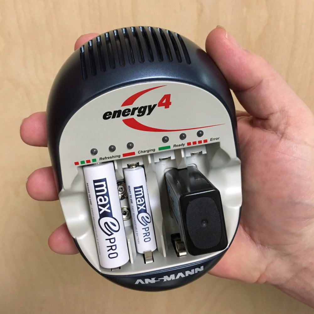 Ansmann Energy 4 - Portable Battery Charger held in hand