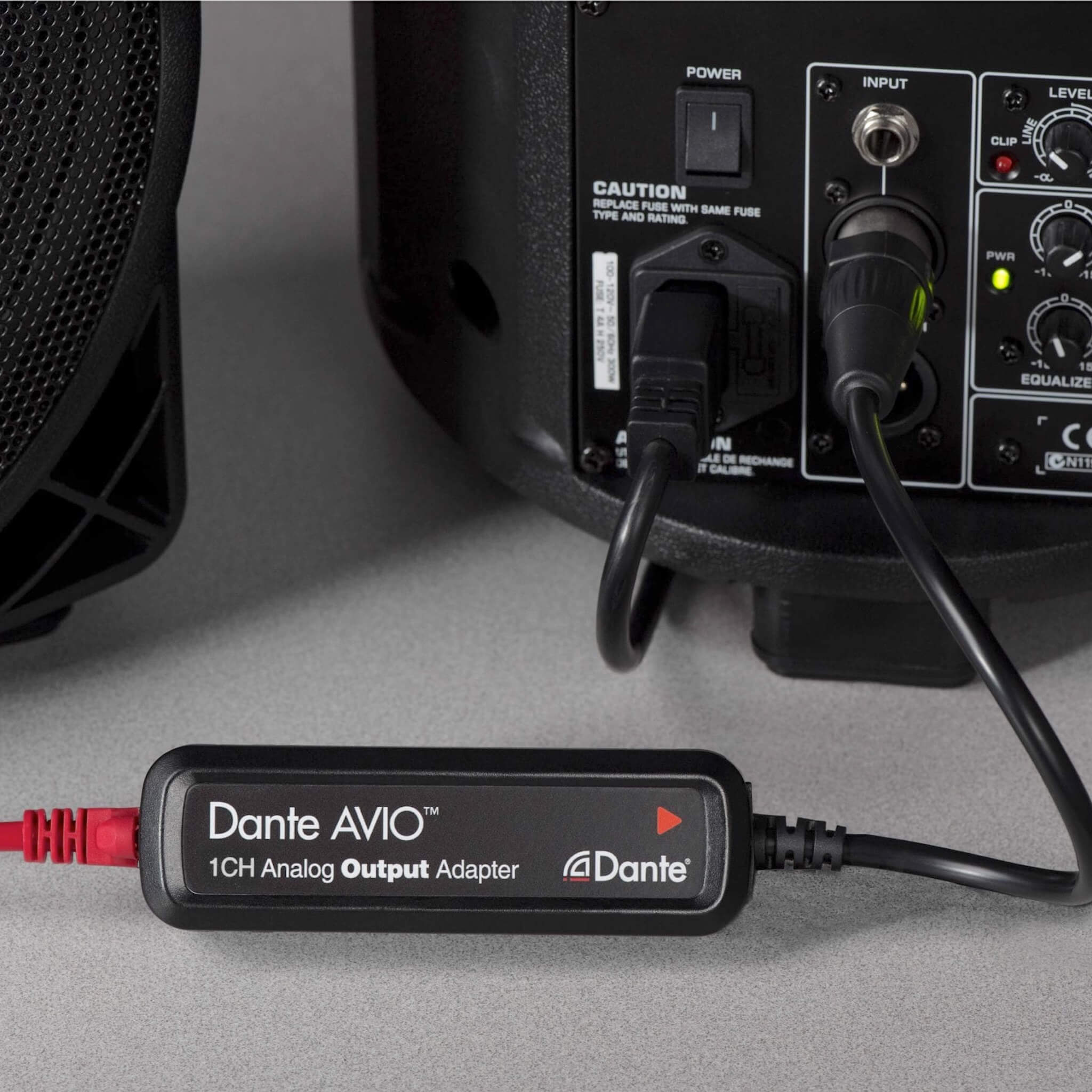 Audinate Dante AVIO 1-Channel Analog Output Adapter, connected to a portable PA system