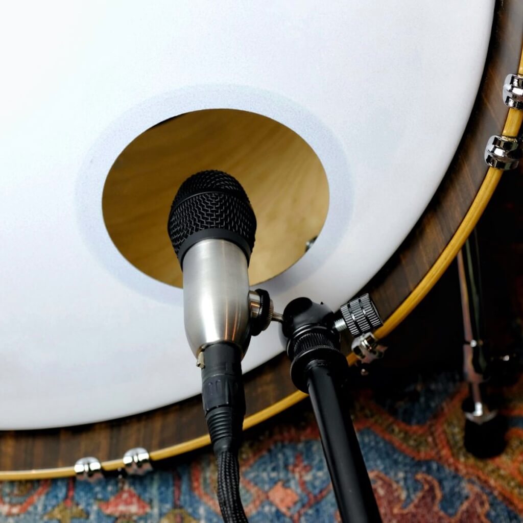 Earthworks DM6 SeisMic - Supercardioid Condenser Kick Drum Microphone, mounted in a kick drum