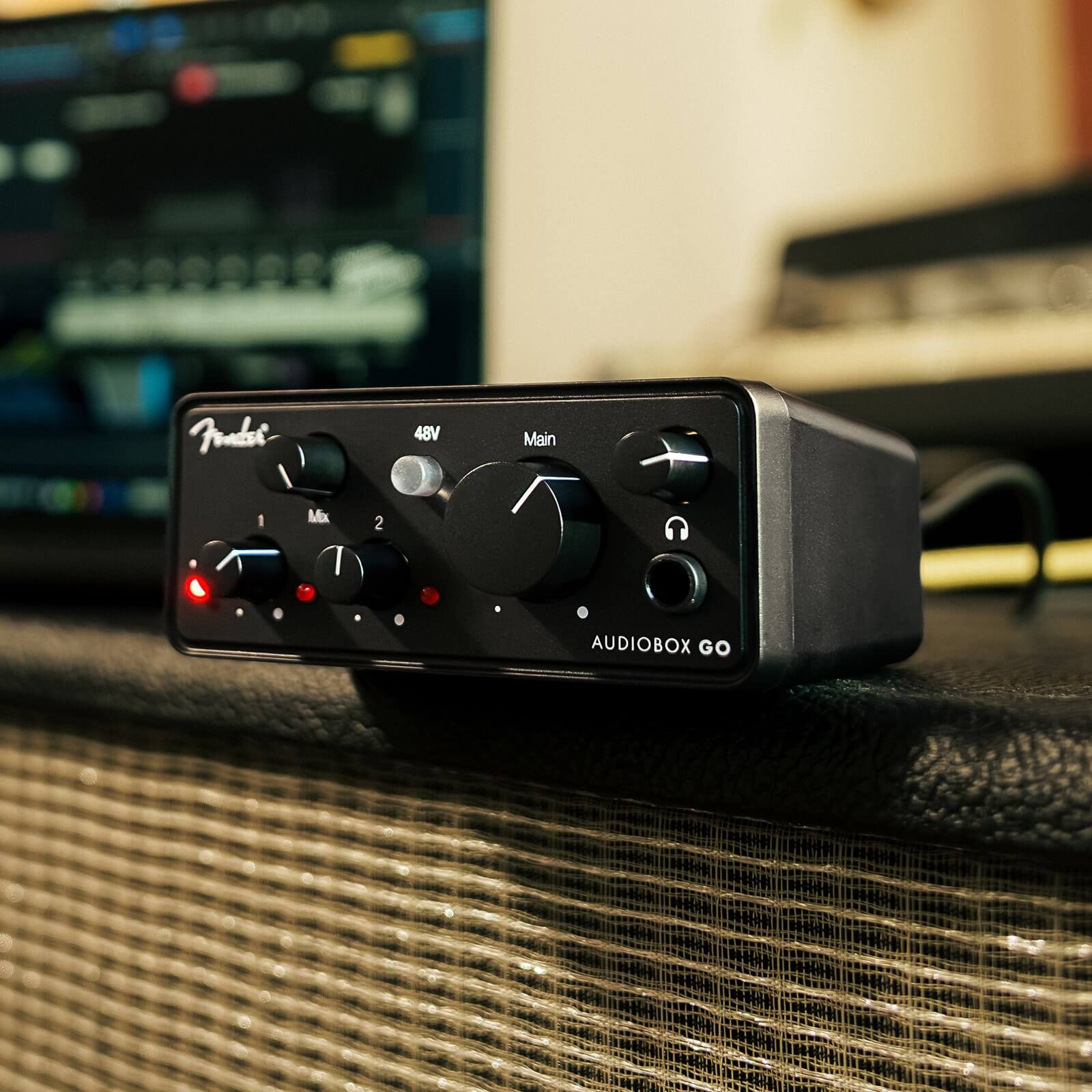 Fender AudioBox Go USB-C audio interface on a guitar amplifier