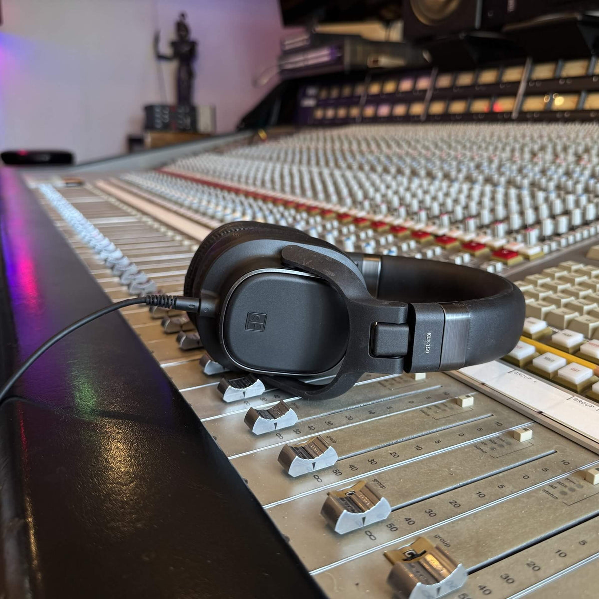 sE Electronics KLS 150 - Professional Closed-Back Over-Ear Headphones, set on an audio mixer