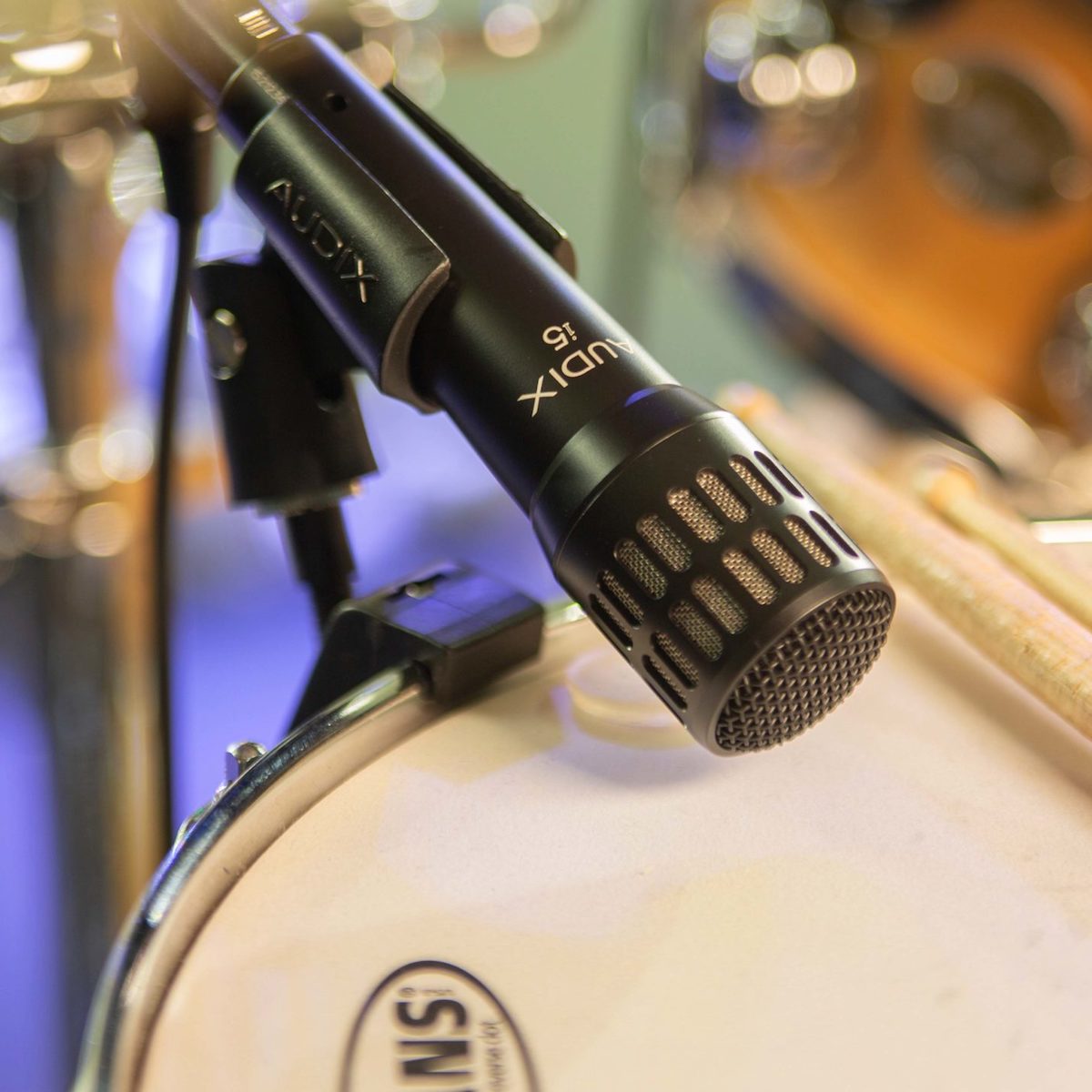 Audix i5 All-Purpose Professional Dynamic Instrument Microphone mounted on a drum