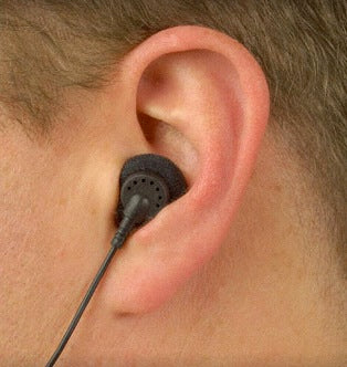 Listen LA-404 - Single Ear Bud, Friction Fit with One Replaceable Cushion, shown in ear