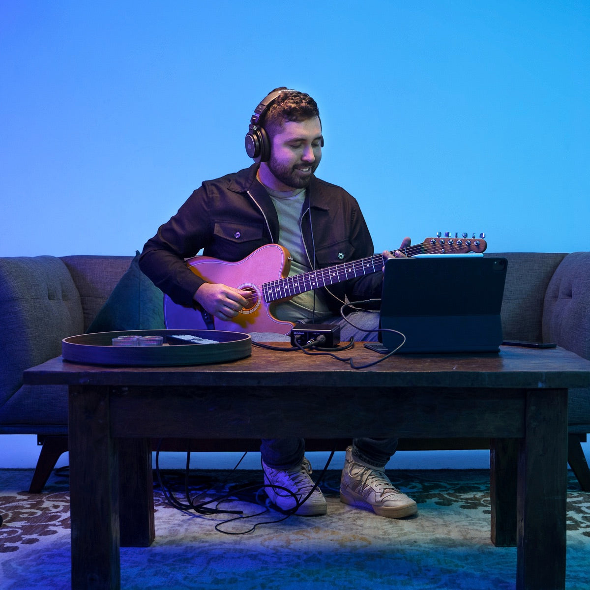 PreSonus AudioBox GO - Ultra-compact Mobile 2x2 USB Audio Interface, used by a guitar player in the living room